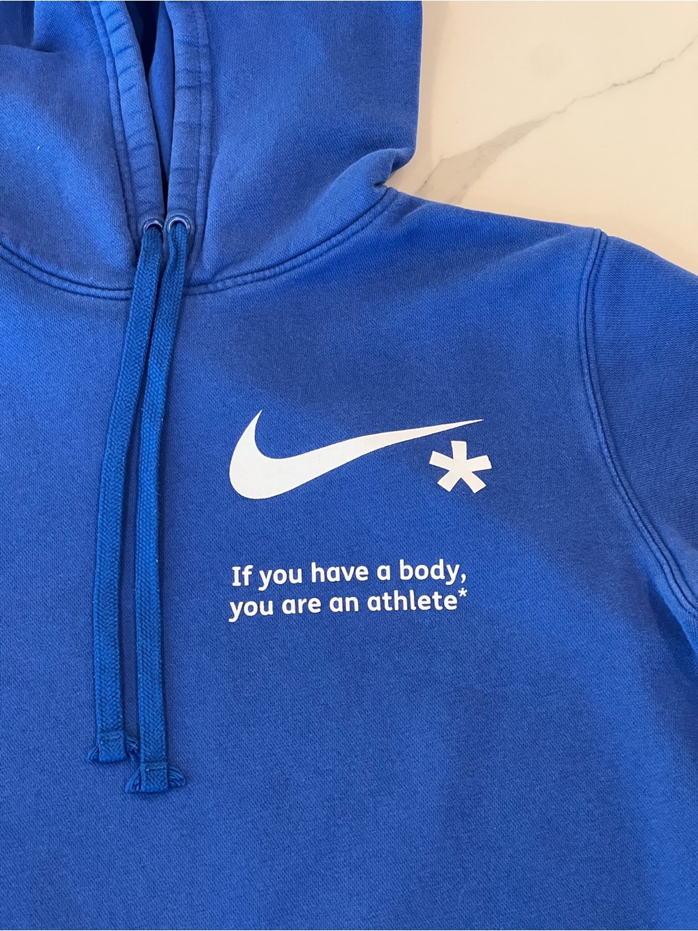 Nike Royal Blue Hoodie with White Swoosh and Slogan